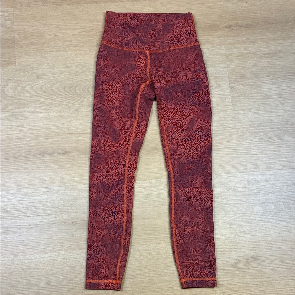 Lululemon size 4 Women’s Red and Orange Active Patterned Leggings